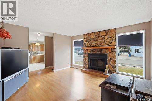 142 Heise Crescent, Saskatoon, SK - Indoor Photo Showing Living Room With Fireplace