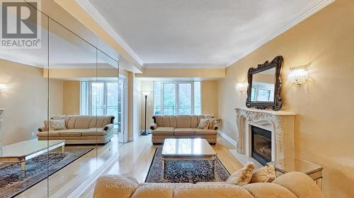 603 - 11 William Carson Crescent, Toronto, ON - Indoor Photo Showing Living Room With Fireplace