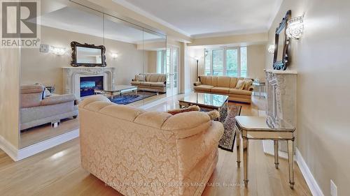 603 - 11 William Carson Crescent, Toronto, ON - Indoor Photo Showing Living Room With Fireplace