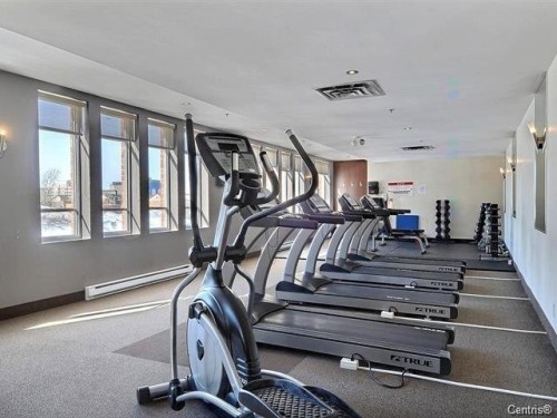 Exercise Room - Ph02-2160 Av. Terry-Fox, Laval (Chomedey), QC - Indoor Photo Showing Gym Room