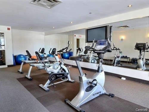 Exercise Room - Ph02-2160 Av. Terry-Fox, Laval (Chomedey), QC - Indoor Photo Showing Gym Room