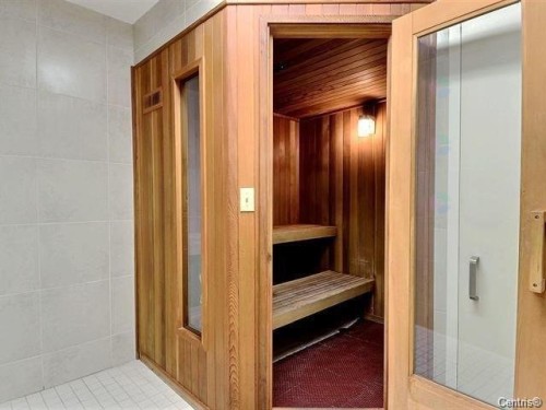 Sauna - Ph02-2160 Av. Terry-Fox, Laval (Chomedey), QC - Indoor Photo Showing Bathroom