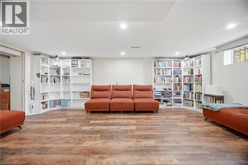 This expansive room features plank flooring and recessed lighting - 38 Leclaire Street, Hamilton, ON - Indoor