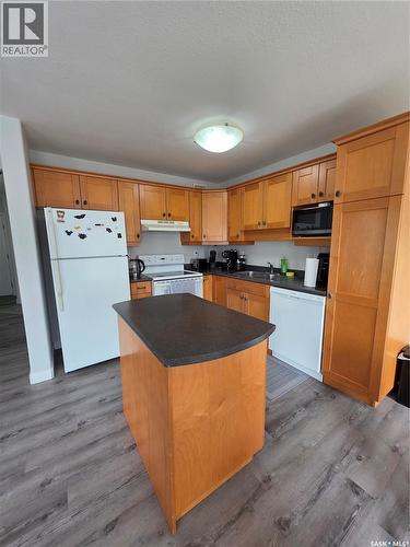 36 103 Banyan Crescent, Saskatoon, SK - Indoor Photo Showing Kitchen With Double Sink