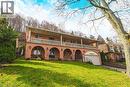 Mediterranean / spanish-style home featuring a balcony, a front yard, brick siding, and a patio - 24 Hildegard Drive, Hamilton, ON  - Outdoor 