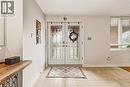 Foyer entrance featuring french doors and light tile patterned floors - 24 Hildegard Drive, Hamilton, ON  - Indoor Photo Showing Other Room 