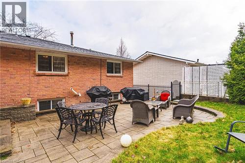 View of patio / terrace featuring grilling area and outdoor dining area - 24 Hildegard Drive, Hamilton, ON - Outdoor With Deck Patio Veranda With Exterior