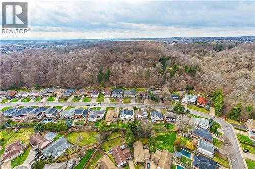 Aerial view of residential area featuring a heavily wooded area - 24 Hildegard Drive, Hamilton, ON - Outdoor With View