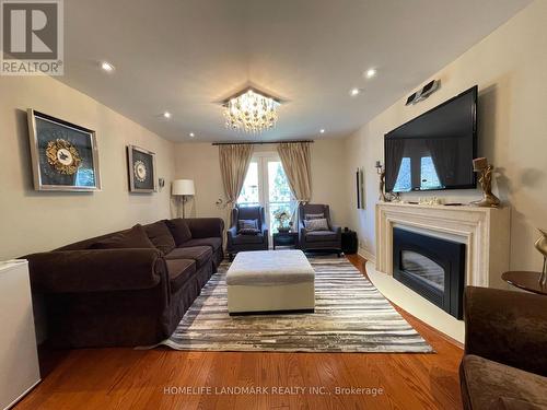 35 Gardiner Road E, Toronto, ON - Indoor Photo Showing Living Room With Fireplace
