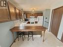 231 Elliott Place, Swift Current, SK  - Indoor Photo Showing Kitchen With Double Sink 