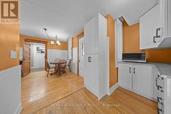 Shot of butler's pantry and kitchen - 