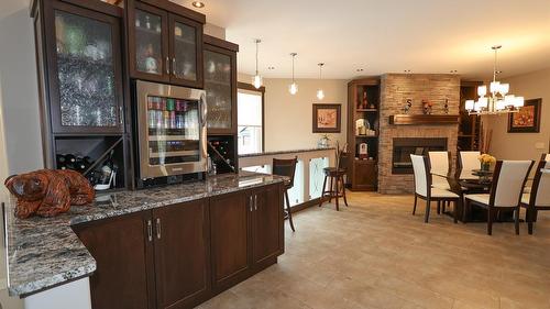 100 Forest Crowne Crescent, Kimberley, BC - Indoor With Fireplace