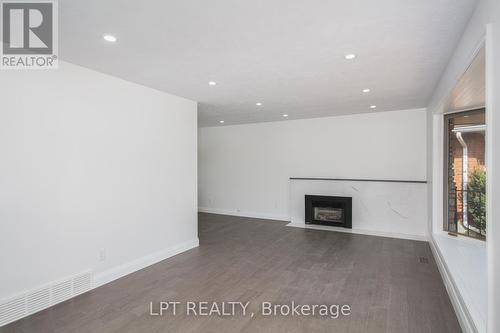2317 Elmira Drive, Ottawa, ON - Indoor With Fireplace