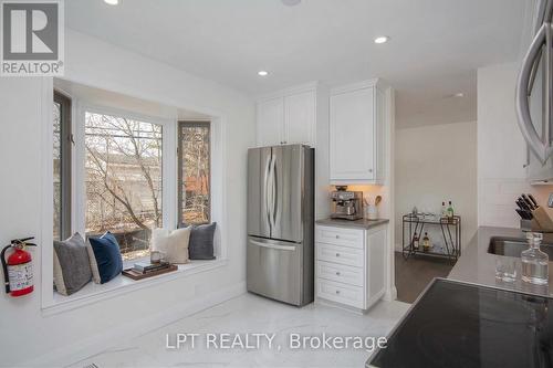 Virtually Staged - 2317 Elmira Drive, Ottawa, ON - Indoor Photo Showing Kitchen