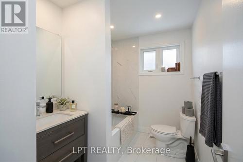 Virtually Staged - 2317 Elmira Drive, Ottawa, ON - Indoor Photo Showing Bathroom