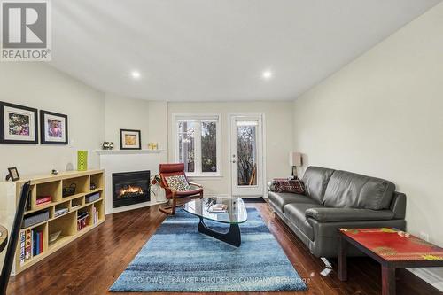 60 Mayflower Private, Ottawa, ON - Indoor Photo Showing Living Room With Fireplace