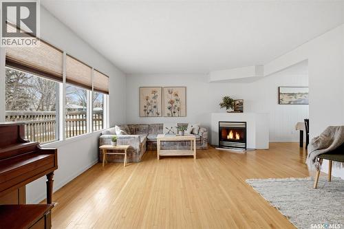 25 Knowles Crescent, Regina, SK - Indoor Photo Showing Living Room With Fireplace