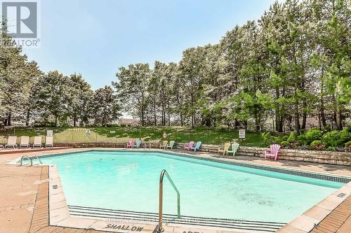 #802 - 20 Cherrytree Drive, Brampton, ON - Outdoor With In Ground Pool With Backyard