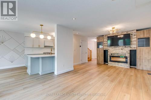 64 Templewood Drive, Kitchener, ON - Indoor Photo Showing Living Room With Fireplace