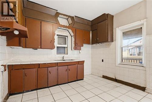 249 Wentworth Street N, Hamilton, ON - Indoor Photo Showing Kitchen With Double Sink