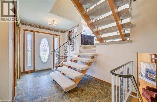 Foyer featuring stairs and stone like finish flooring - 564 Glen Manor Boulevard, Waterloo, ON - Indoor Photo Showing Other Room