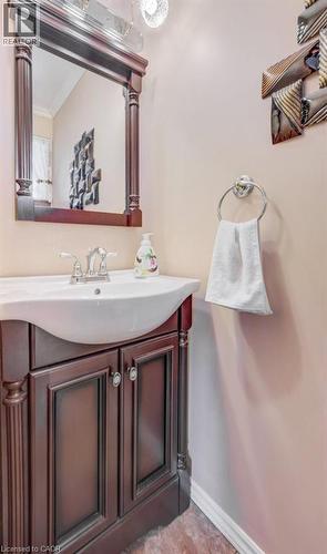 This 2 pc bathroom is off the family room on the main level. - 564 Glen Manor Boulevard, Waterloo, ON - Indoor Photo Showing Bathroom