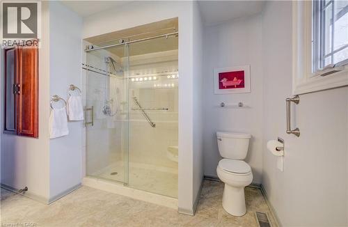 Double sink, linen closet and doors to primary bedroom or hall - 564 Glen Manor Boulevard, Waterloo, ON - Indoor Photo Showing Bathroom