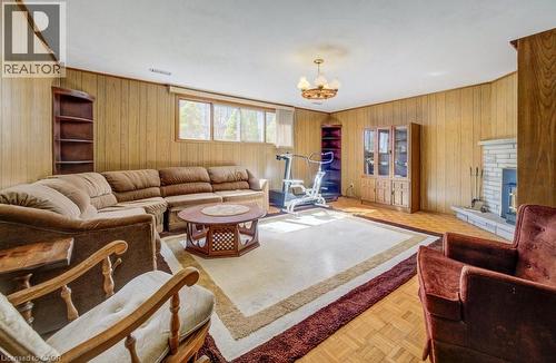 This spacious living area WITH LARGE WINDOWS - 564 Glen Manor Boulevard, Waterloo, ON - Indoor Photo Showing Other Room