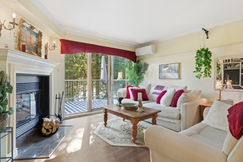Living Room - 215-778 Rue Principale, Saint-Sauveur, QC - Indoor Photo Showing Living Room With Fireplace