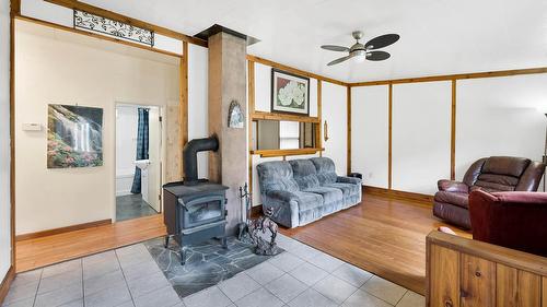 3782 River Drive, Blue River, BC - Indoor Photo Showing Living Room With Fireplace