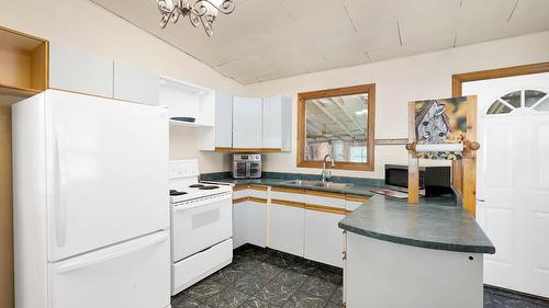 3782 River Drive, Blue River, BC - Indoor Photo Showing Kitchen With Double Sink