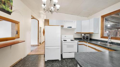 3782 River Drive, Blue River, BC - Indoor Photo Showing Kitchen With Double Sink