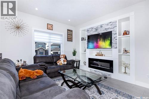123 Mcarthur Lane, Saskatoon, SK - Indoor Photo Showing Living Room With Fireplace