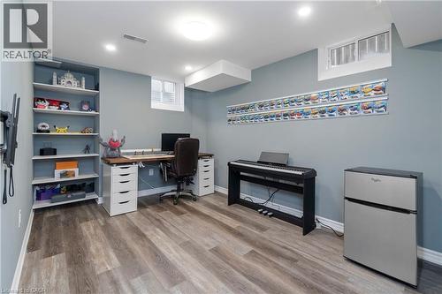 The room features light blue walls, recessed lighting - 4 Macbean Crescent, Waterdown, ON - Indoor