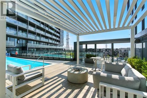 A814 - 3210 Dakota Common, Burlington, ON - Outdoor With In Ground Pool