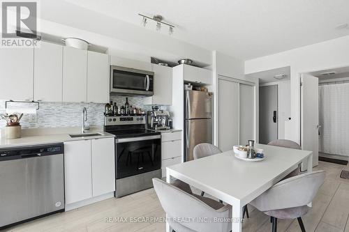 A814 - 3210 Dakota Common, Burlington, ON - Indoor Photo Showing Kitchen