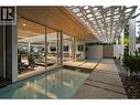 Floating concrete bridge into gym - 4110 Lakeshore Road, Kelowna, BC  -  
