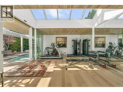 Skylights imported from Denmark - 4110 Lakeshore Road, Kelowna, BC - Indoor Photo Showing Gym Room