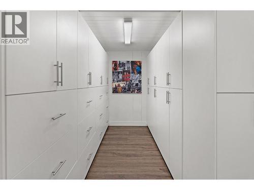 Storage in laundry room - 4110 Lakeshore Road, Kelowna, BC - Indoor Photo Showing Other Room