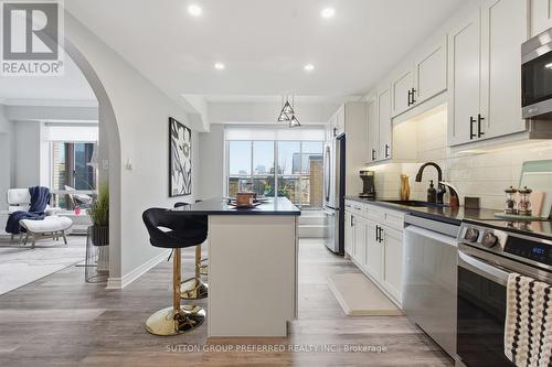 310 - 250 Sydenham Street, London East (East B), ON - Indoor Photo Showing Kitchen With Stainless Steel Kitchen With Upgraded Kitchen