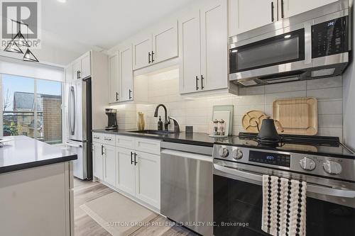 310 - 250 Sydenham Street, London East (East B), ON - Indoor Photo Showing Kitchen With Stainless Steel Kitchen With Upgraded Kitchen