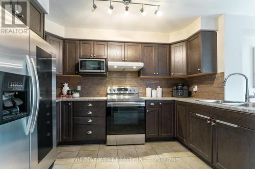 110 Banting Crescent, Essa, ON - Indoor Photo Showing Kitchen With Double Sink