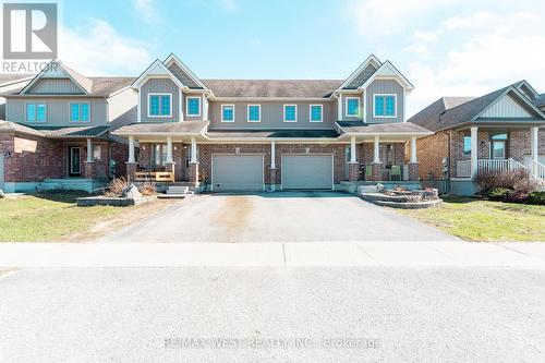 110 Banting Crescent, Essa, ON - Outdoor With Deck Patio Veranda With Facade