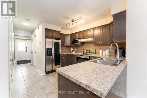 110 Banting Crescent, Essa, ON - Indoor Photo Showing Kitchen With Double Sink