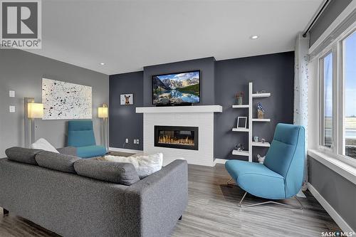 8933 Kestral Drive, Regina, SK - Indoor Photo Showing Living Room With Fireplace