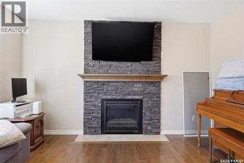 159 Dulmage Crescent, Saskatoon, SK - Indoor Photo Showing Living Room With Fireplace