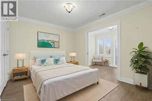 this photo is virtually staged - 22 Sister Kern Terrace, Hamilton, ON - Indoor Photo Showing Bedroom