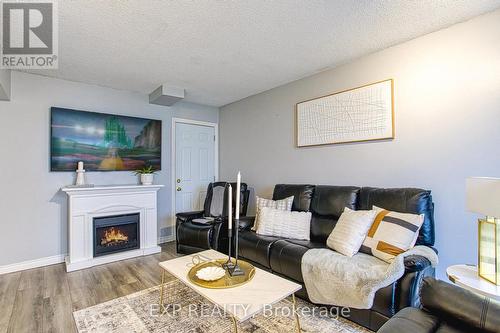 202 Golden Orchard Drive, Hamilton, ON - Indoor Photo Showing Living Room With Fireplace