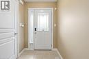 Entryway featuring tile patterned flooring and baseboards - 91 Chamomile Drive, Hamilton, ON  - Indoor Photo Showing Other Room 