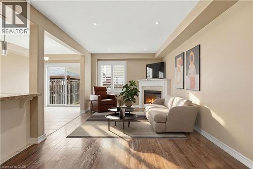 91 Chamomile Drive, Hamilton, ON - Indoor Photo Showing Living Room With Fireplace